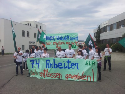 Zizurkilgo langileak Huyck Wangnerren egoitza nagusian